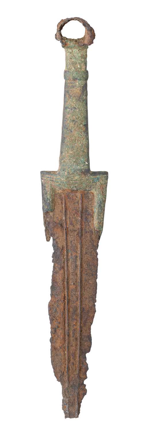 Lot 56 - â€¡ A NORTH-WEST PERSIAN BRONZE AND IRON DAGGER