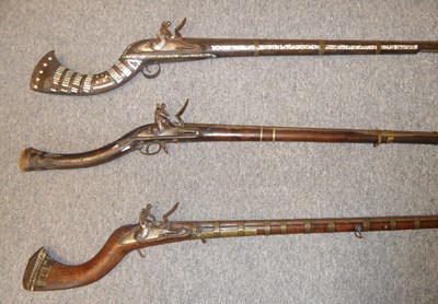 Lot 106 - THREE AFGHAN FLINTLOCK MUSKETS (JEZAIL)