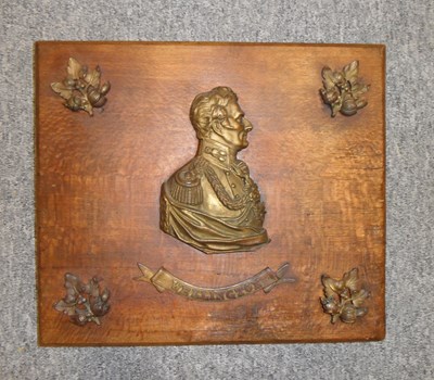 Lot 193 - A DECORATIVE OAK PANEL WITH A PORTRAIT BUST PROFILE OF ARTHUR WELLESLEY
