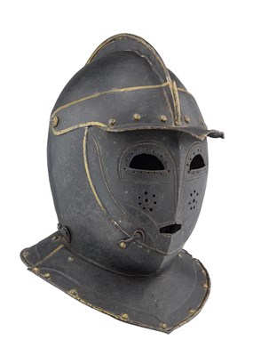 Lot 194 - â€¡ A GERMAN CLOSE HELMET OF SO-CALLED 'TODENKOPF' FASHION