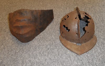 Lot 279 - â€¡ THE SKULL OF A NORTH EUROPEAN HARQUEBUSIER'S POT