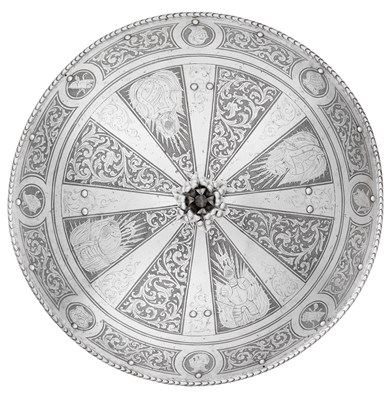 Lot 298 - â€¡ A STEEL TARGET WITH ETCHED DECORATION