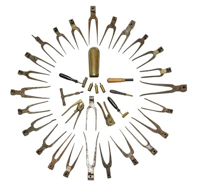 Lot 524 - A QUANTITY OF IRON BULLET MOULDS AND A SMALL QUANTITY OF OTHER FIREARMS ACCESSORIES