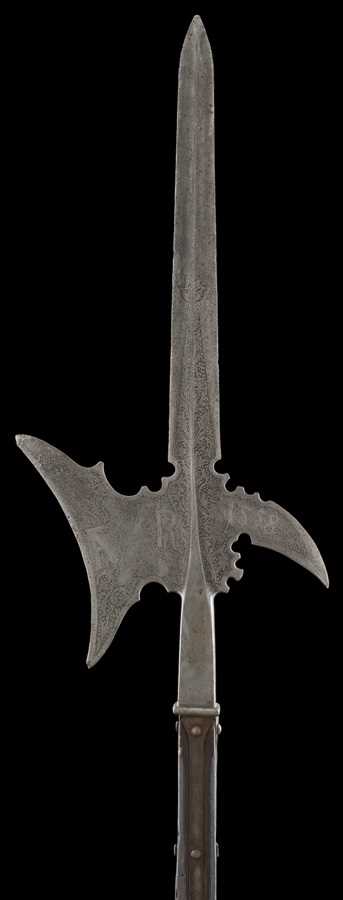 Lot 174 - A DECORATED HALBERD AFTER THE GERMAN STYLE OF 1558 FOR THE EMPEROR FERDINAND I