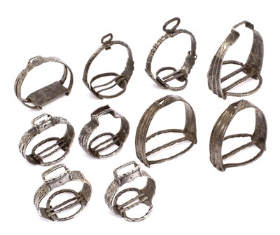 Lot 257 - THREE PAIRS OF STIRRUPS IN 16TH CENTURY STYLE AND FOUR SINGLE STIRRUPS