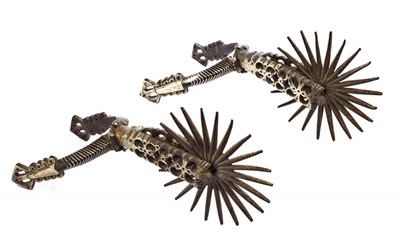 Lot 263 - A PAIR OF MEXICAN SILVER-MOUNTED STEEL ROWEL SPURS