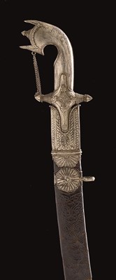 Lot 29 - AN ARAB SILVER-HILTED SAIF