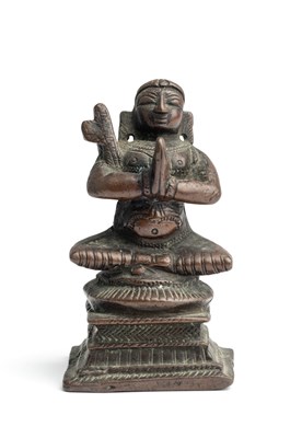 Lot 147 - A BRONZE FIGURE OF RAMANUJA, TAMIL NADU, SOUTH INDIA, 19TH CENTURY