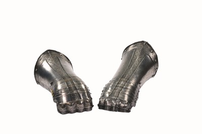 Lot 264 - A FINE PAIR OF SOUTH GERMAN ETCHED AND GILT GAUNTLETS