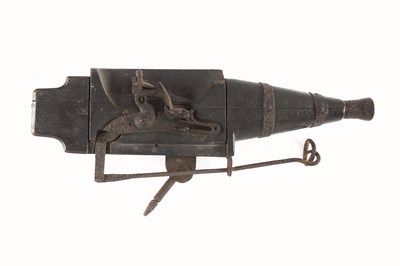 Lot 348 - A FLINTLOCK 'SPRING' TRAP GUN