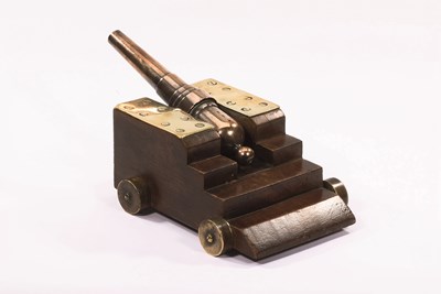 Lot 355 - A BRASS MODEL CANNON