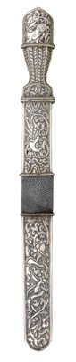 Lot 25 - A BHUTANESE SILVER-MOUNTED DAGGER
