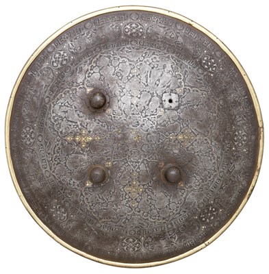 Lot 74 - **AN INDO-PERSIAN SHIELD (DHAL)