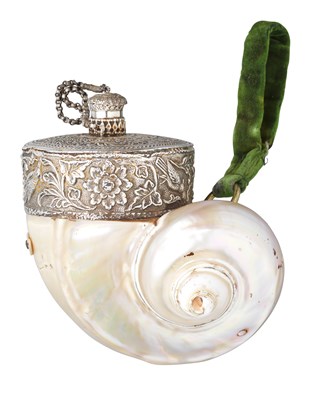 Lot 82 - AN INDIAN SILVER-MOUNTED SHELL POWDER-FLASK