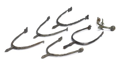 Lot 208 - A ROMAN MILITARY SPUR AND FIVE PRICK SPURS