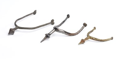 Lot 209 - THREE DECORATED PRICK SPURS