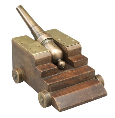 Lot 245 - A BRASS MODEL CANNON