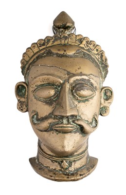 Lot 153 - A BRASS SIVA MASK, WESTERN DECCAN, INDIA, 18TH/19TH CENTURY