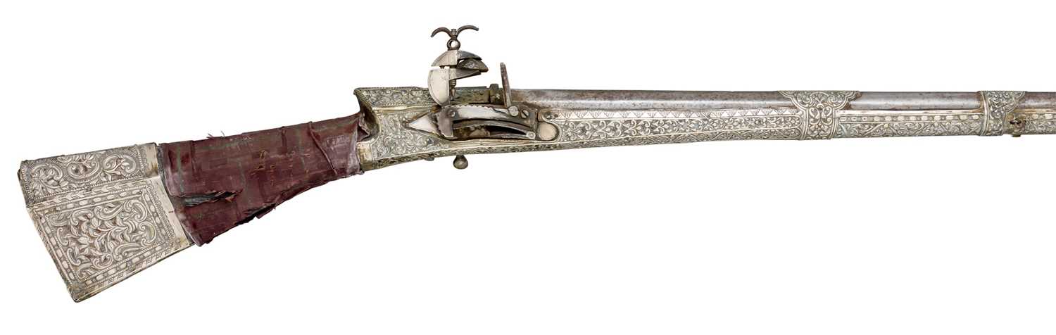 Lot 84 - **AN 18 BORE OTTOMAN BALKAN SILVER-MOUNTED MIQUELET-LOCK MUSKET