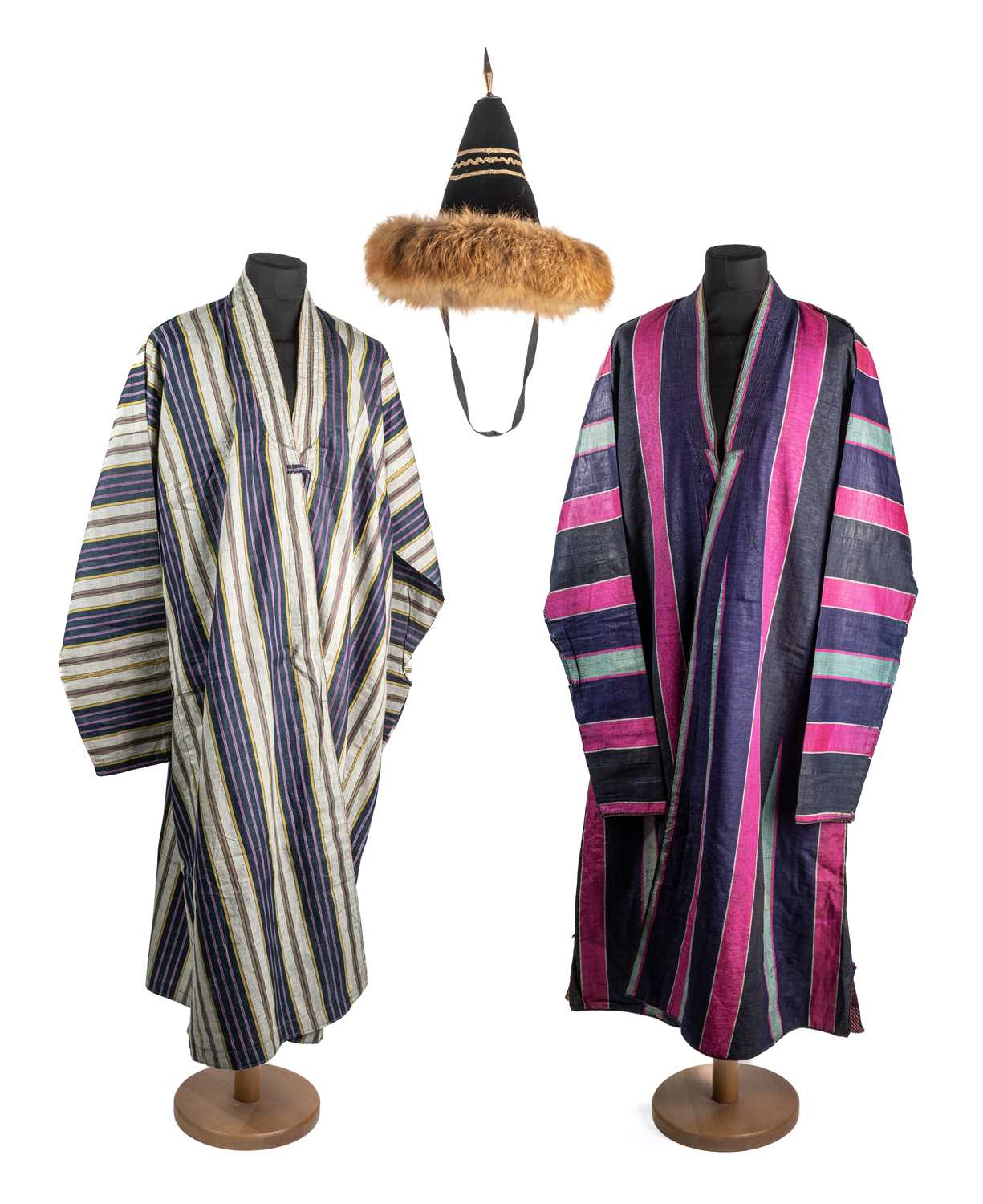 Lot 235 - TWO TURKMEN SILK COATS (CHAPAN) AND A MONGOLIAN HAT, CENTRAL ASIA, 20TH CENTURY