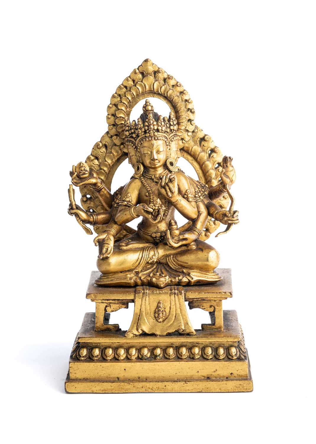 Lot 539 - A GILT-BRONZE FIGURE OF USNISAVIJAYA, NEPAL, CIRCA 17TH CENTURY