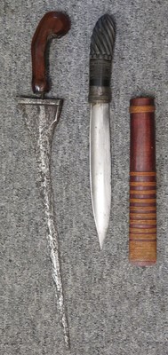 Lot 123 - A SOUTH EAST ASIAN DAGGER (KRIS) AND A FURTHER DAGGER