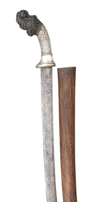 Lot 126 - â€¡ AN INDONESIAN SILVER-MOUNTED SHORTSWORD (PARANG)