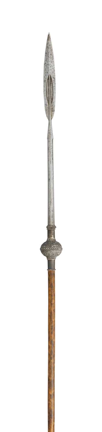 Lot 191 - AN INDIAN SILVER-MOUNTED SPEAR