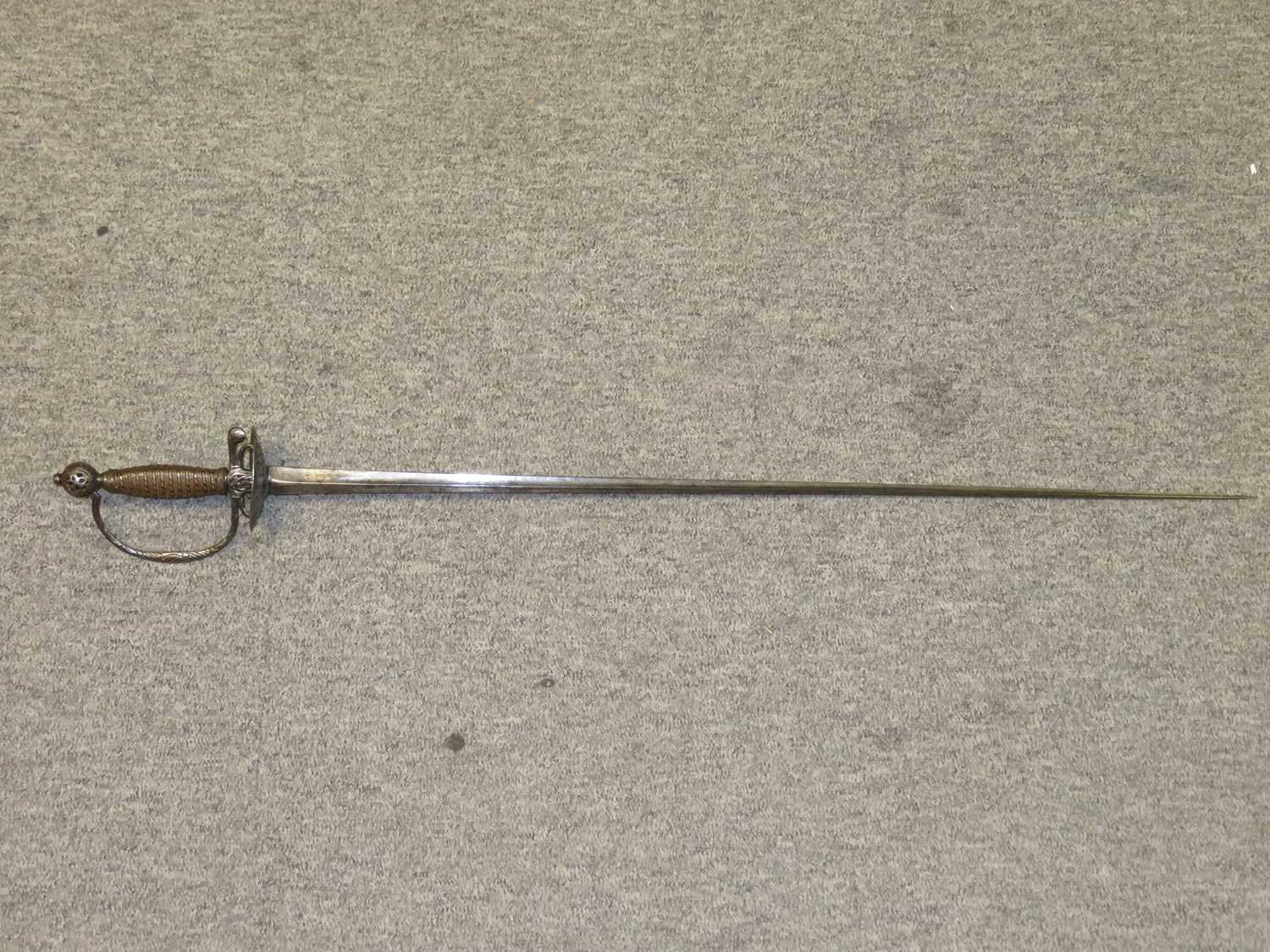 Lot 255 - A SMALL SWORD WITH CHISELLED IRON HILT