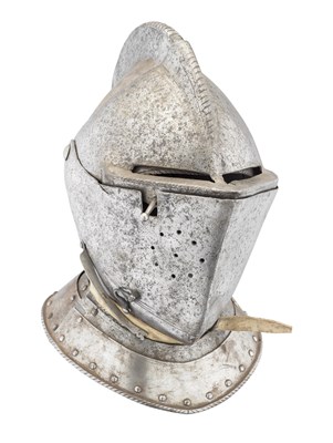 Lot 344 - A NORTH ITALIAN CLOSE HELMET FOR HEAVY FIELD USE