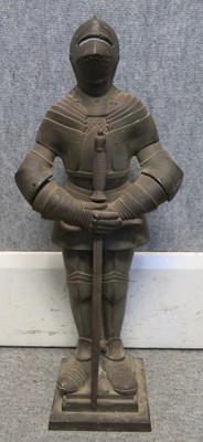 Lot 348 - A CAST IRON STATUETTE OF A MAN IN FULL ARMOUR