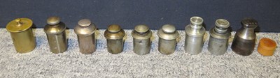 Lot 427 - NINE OIL BOTTLES