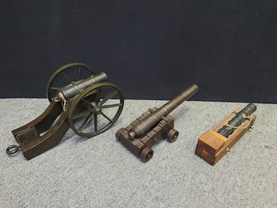 Lot 450 - TWO MINIATURE CANNON AND A MINIATURE HOWITZER
