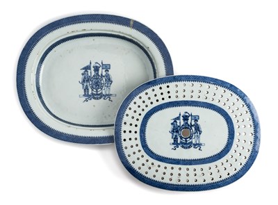 Lot 36 - A CHINESE EXPORT ARMORIAL BLUE AND WHITE MEAT DISH AND A STRAINER,  CIRCA 1790