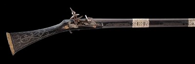 Lot 276 - AN ALGERIAN SILVER-MOUNTED TOE-LOCK MUSKET