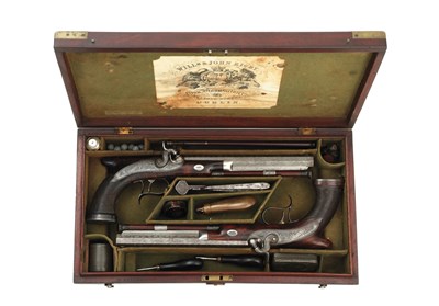 Lot 449 - **a pair of percussion saw-handled duelling pistols by william & john rigby
