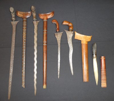 Lot 69 - ËœFOUR SOUTH EAST ASIAN DAGGERS (KRIS) AND A FURTHER DAGGER