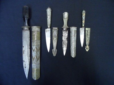 Lot 71 - TWO BHUTANESE DAGGERS AND TWO ARGENTINIAN GOUCHO KNIVES