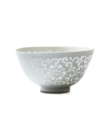 Lot 14 - A RARE CHINESE WHITE-GLAZED 'OPEN-WORK' 'LOTUS' BOWL, QING DYNASTY (1644-1911)