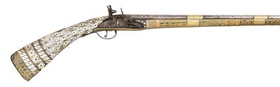 Lot 105 - A 22 BORE WEST BALKANS FLINTLOCK GUN (HERZEGOVINA OR MONTENEGRO)