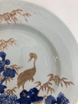 Lot 56 - A CHINESE BLUE AND GILT 'CRANE AND BAMBOO' PLATE, QING DYNASTY, YONGZHENG PERIOD (1723-35)