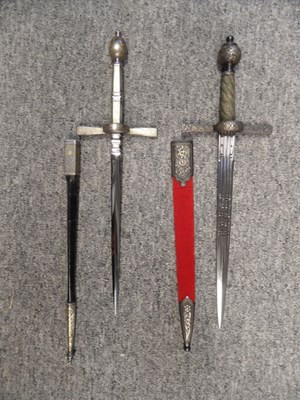 Lot 303 - TWO LEFT-HAND DAGGERS IN LATE 16TH/EARLY 17TH CENTURY STYLE