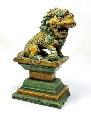 Lot 41 - A CHINESE SANCAI-GLAZED LION, 19TH CENTURY