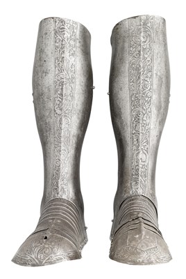 Lot 429 - A PAIR OF ETCHED GREAVES AND SABATONS IN THE SOUTH GERMAN STYLE OF THE THIRD QUARTER OF THE 16TH CEN