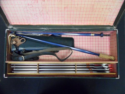 Lot 541 - A CASED ARCHERY SET