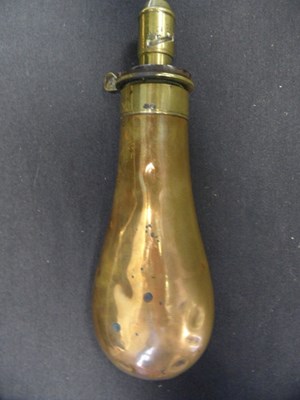 Lot 557 - A COPPER POWDER-FLASK BY JAMES DIXON & SONS