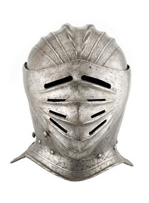 Lot 587 - A FLUTED CLOSE HELMET IN THE SO-CALLED GERMAN 'MAXIMILIAN' FASHION OF CIRCA 1515-30