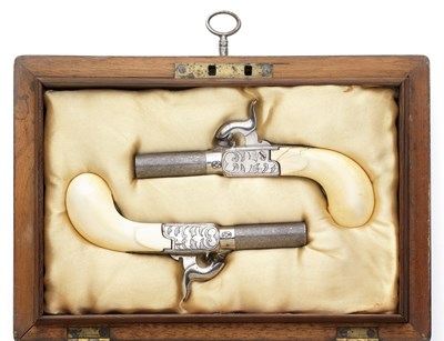 Lot 601 - ËœA CASED PAIR OF 120 BORE BELGIAN IVORY-MOUNTED PERCUSSION POCKET PISTOLS