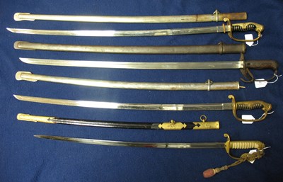 Lot 13 - A W.W.II JAPANESE ARMY OFFICER'S PARADE SABRE; A W.W. II JAPANESE NAVAL OFFICER'S PARADE SABRE; A