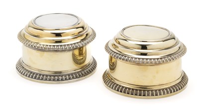 Lot 177 - A PAIR OF VICTORIAN SILVER-GILT TOILET BOXES, F.B. THOMAS & CO. OVERSTRIKING ANOTHER, LONDON, 1884